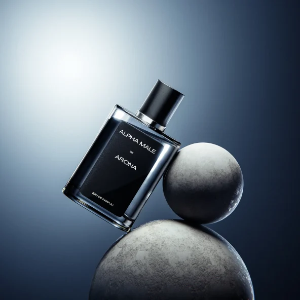 Black Alpha Male Arona fragrance bottle balanced on textured spheres against a dark blue background.