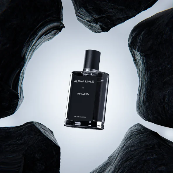 Sleek black Alpha Male by Aroma perfume bottle centered among dark sculptural rocks, creating a dramatic, luxurious, mysterious mood.