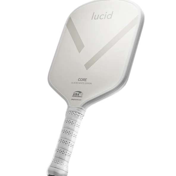 White Lucid Core pickleball paddle with a perforated grip, angled gray accents, rounded face, and USA Pickleball approval mark.